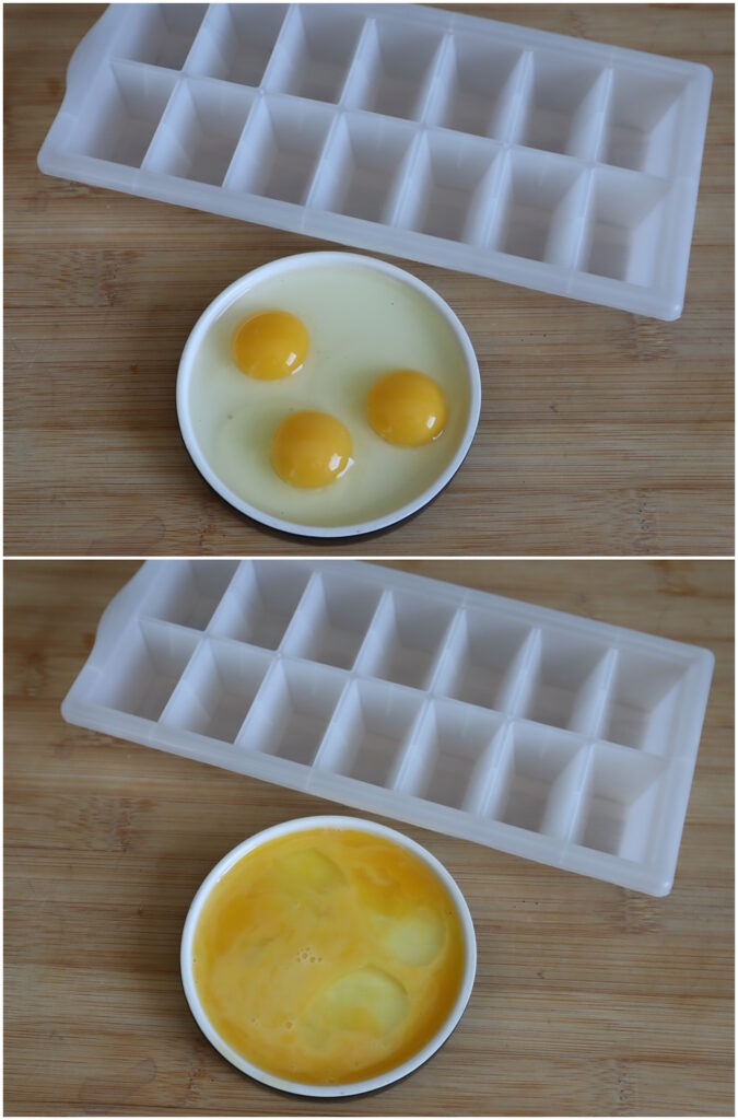 Das Foto zeigt aufgeschlagene, siwie vermischte Wachteleier neben einer Eiswürfelform